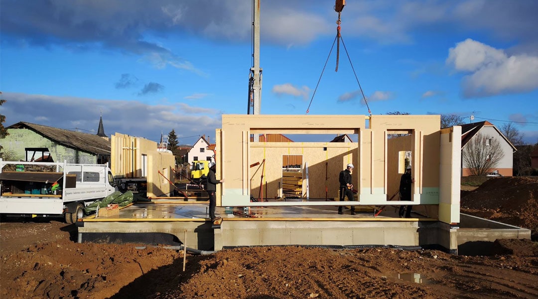 Construction maison ossature bois slide